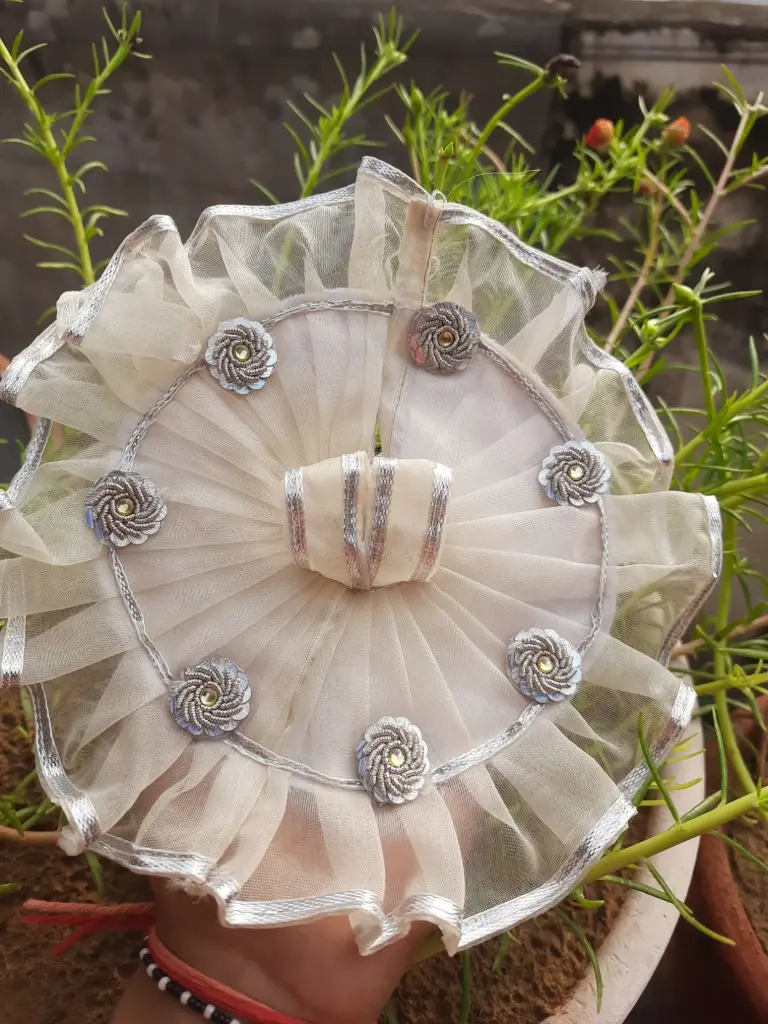 Chandrika – Cream & Silver Krishna Dress with Floral Accents (Premium Net Fabric)